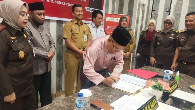 Kejati Gandeng LAM Riau Selenggarakan Restorasi Justice Multiguna