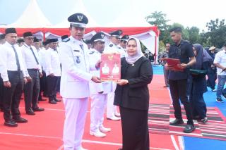 Bupati Kasmarni Kukuhkan Perpanjangan Masa Jabatan Kades dan BPD Kecamatan Pinggir dan Talang Muanda